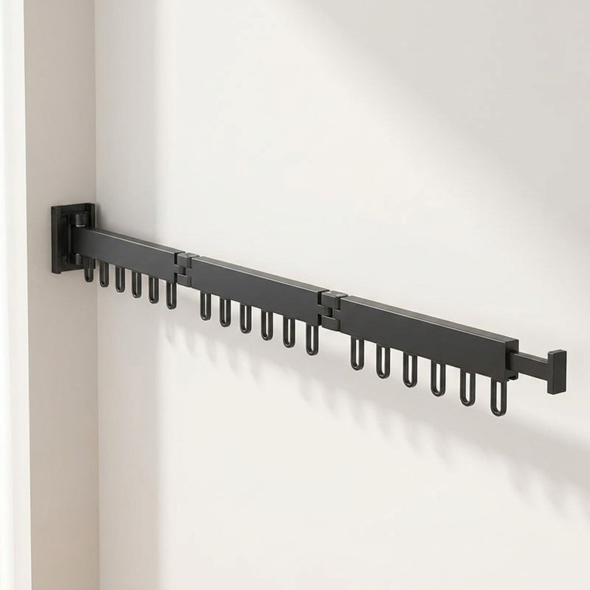 Retractable Drying Rack With Folding Wall-Mount Hanger Extends For Drying Space That Disappears When You're Done - Image 1