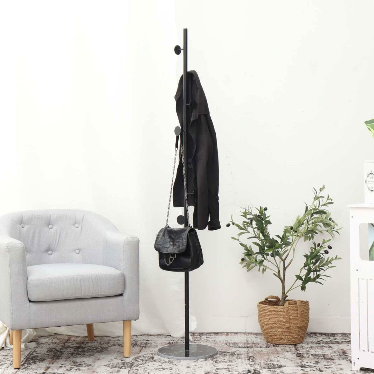 Clothing Rack with Streamlined Freestanding Design and Multiple Hooks - Image 1