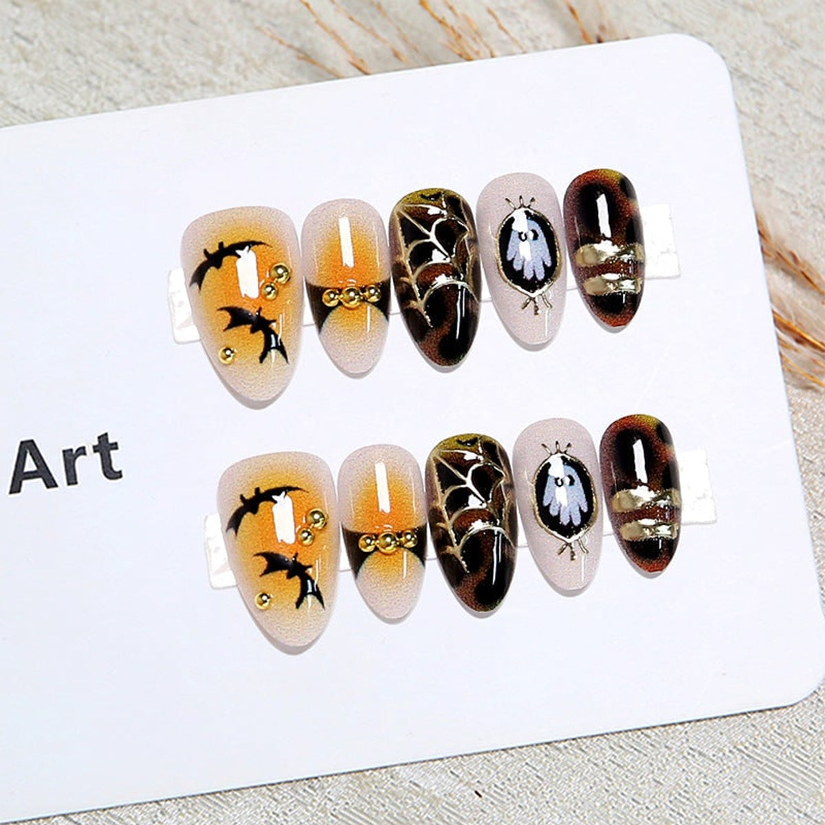Halloween Press On Nails Art Set With Bats Ghosts And Spiderweb Designs In Orange Brown And Beige - Image 3