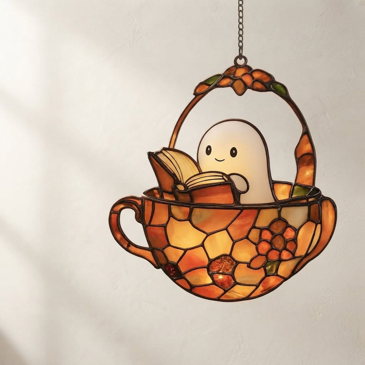 Halloween Suncatcher Ghost Reading Book In Teacup Stained Glass Window Hanging Decoration With Sunlight-Reactive Color Effect For Halloween Decor - Image 1