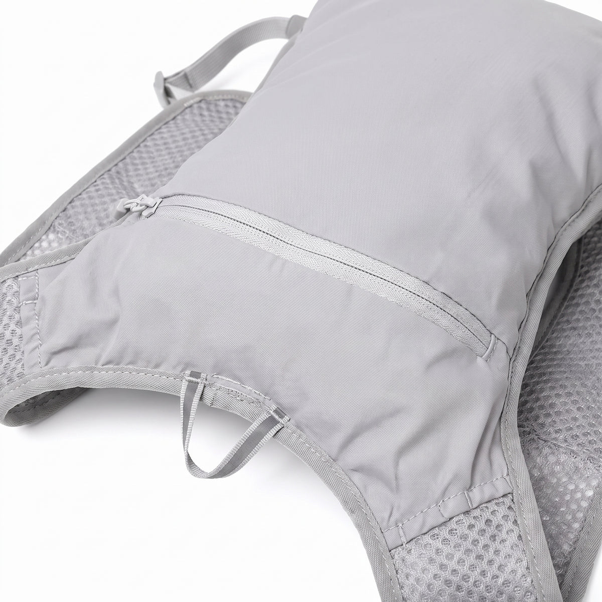 Hydration Backpack with Streamlined Running Pack and Zippered Front - detail